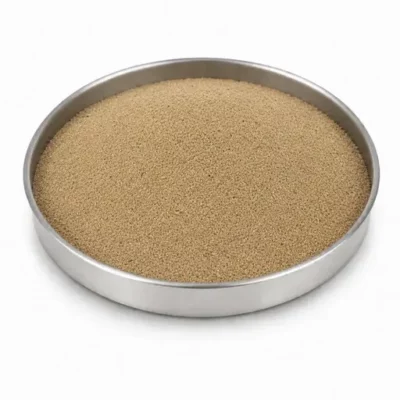 Sand and mold-printing feedstock in a stainless steel sample dish