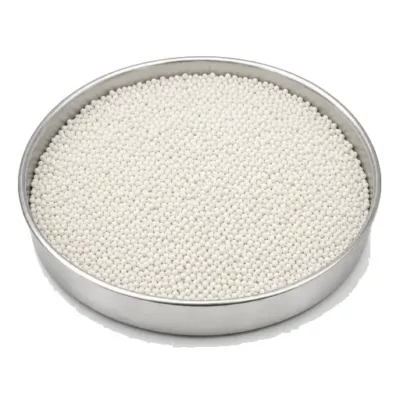 Representative lightweight hollow microspheres in a shallow stainless steel sample dish