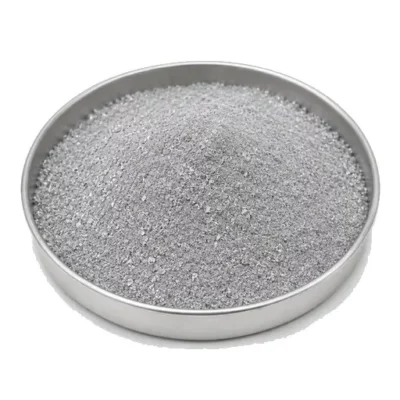 Representative spherical titanium alloy powder in a shallow stainless steel sample dish