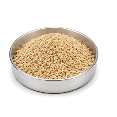 Representative ground grain and cereal meal in a shallow stainless steel sample dish