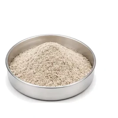 Representative lime, gypsum, and soil-amendment powder in a shallow stainless steel sample dish