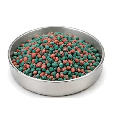 Representative seed-treatment and coating material in a shallow stainless steel sample dish