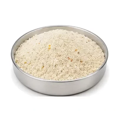 Representative vitamin, enzyme, and feed premix powder in a shallow stainless steel sample dish