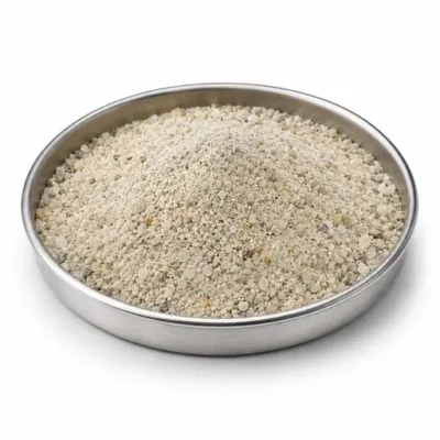 Glass batch minerals and raw materials in a shallow stainless steel sample dish