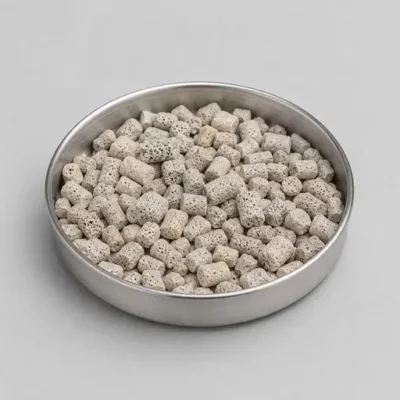Porous catalyst pellets and functional granules in a stainless steel sample dish