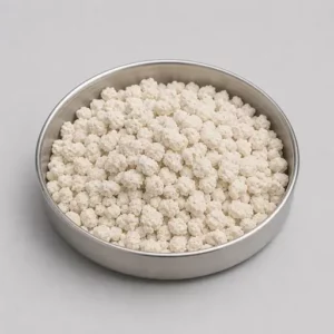 Agglomerated instant food powder in a stainless steel sample dish