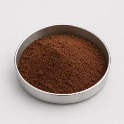 Cocoa, coffee, and beverage powder in a stainless steel sample dish