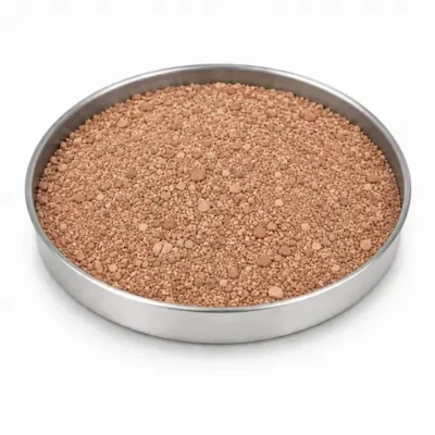 Bauxite and alumina feed material in a stainless steel sample dish