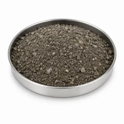 Base-metal concentrate powder in a stainless steel sample dish