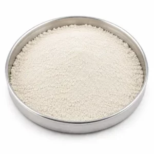 Fine off-white mineral extender powder in a shallow stainless steel sample dish
