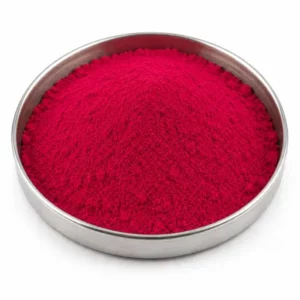 Vibrant organic pigment powder in a shallow stainless steel sample dish