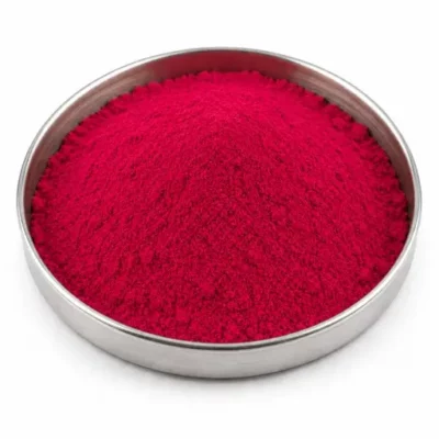 Organic pigment powder in a stainless steel sample dish