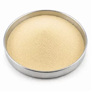 Pale resin powder in a shallow stainless steel sample dish