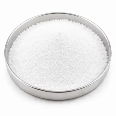 White titanium dioxide pigment powder in a stainless steel sample dish