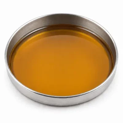 Liquid wetting agent in a stainless steel sample dish