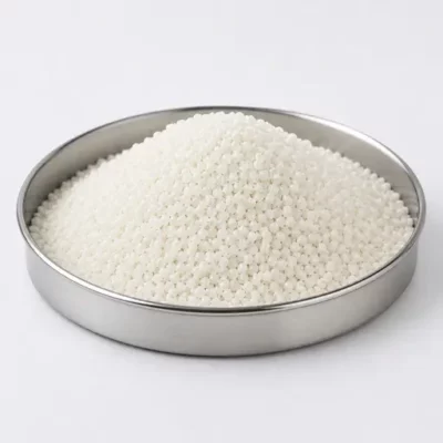 Compounded polymer pellets and a dry blend in a stainless steel sample dish