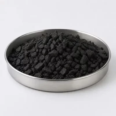 Elastomer crumb and rubber powder in a stainless steel sample dish