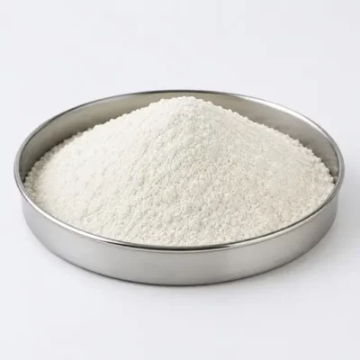 Fine white polymer powder with resin fines in a stainless steel sample dish