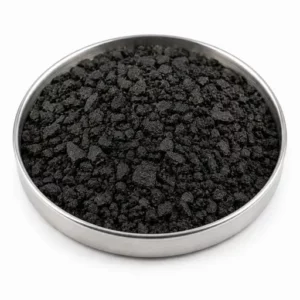 Irregular recycled rubber crumb in a shallow stainless steel sample dish